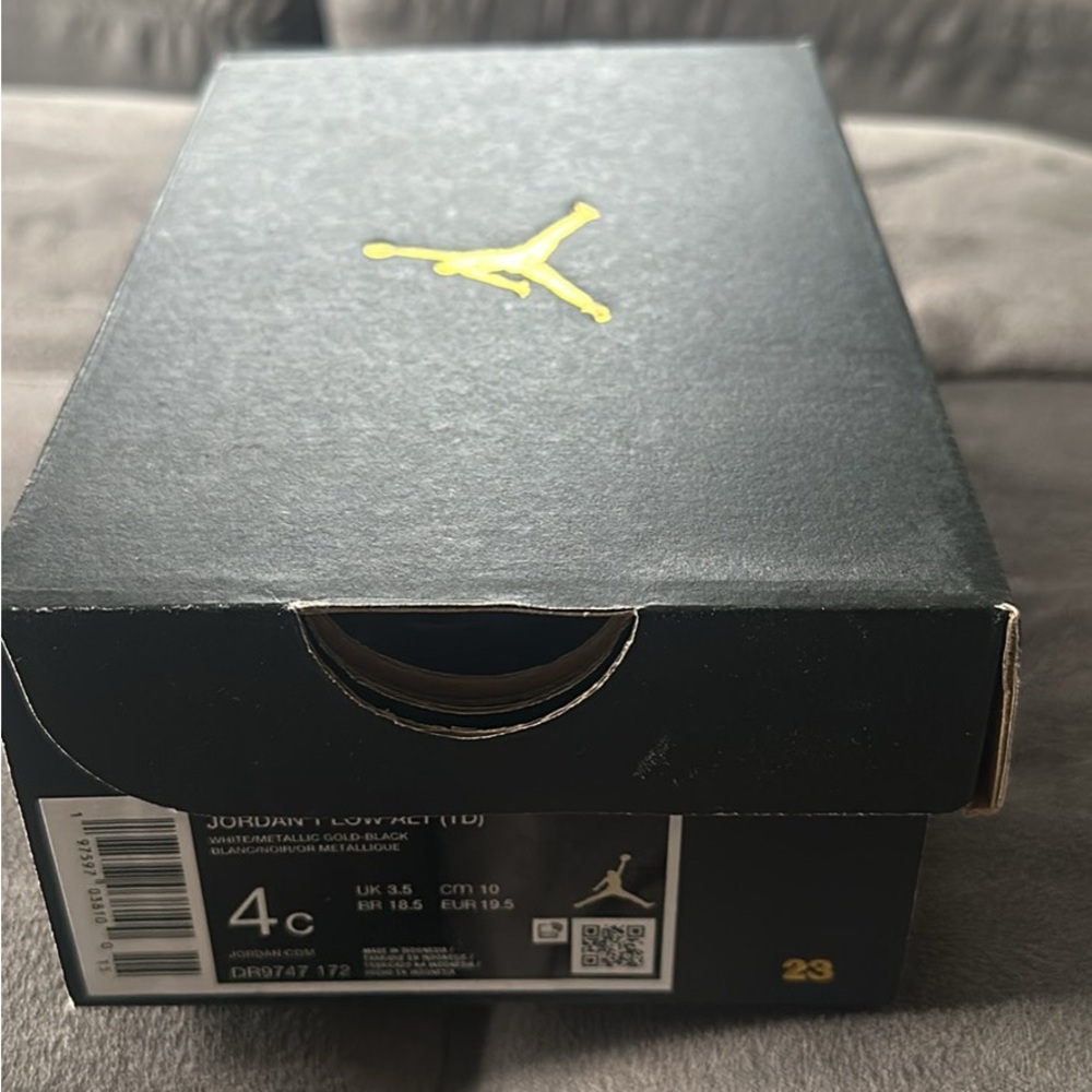 Nike Sneakers Black and Gold